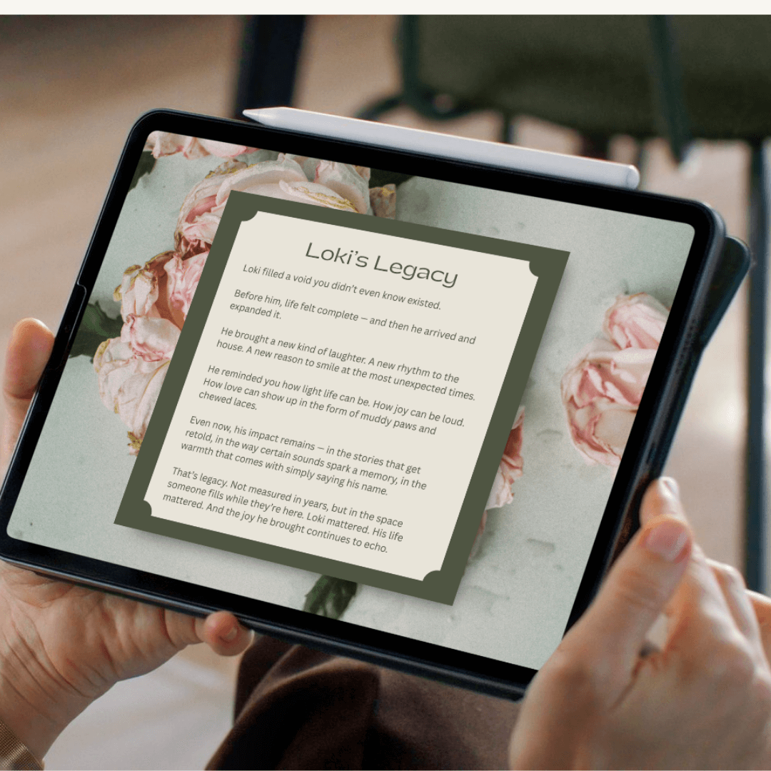 Personalized Pet Memorial Book - Custom Tribute Keepsake displayed on tablet with flowers in the background.