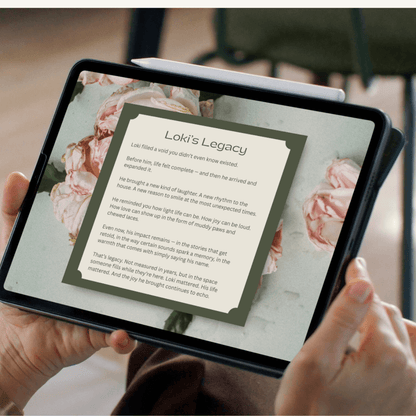 Personalized Pet Memorial Book - Custom Tribute Keepsake displayed on tablet with flowers in the background.